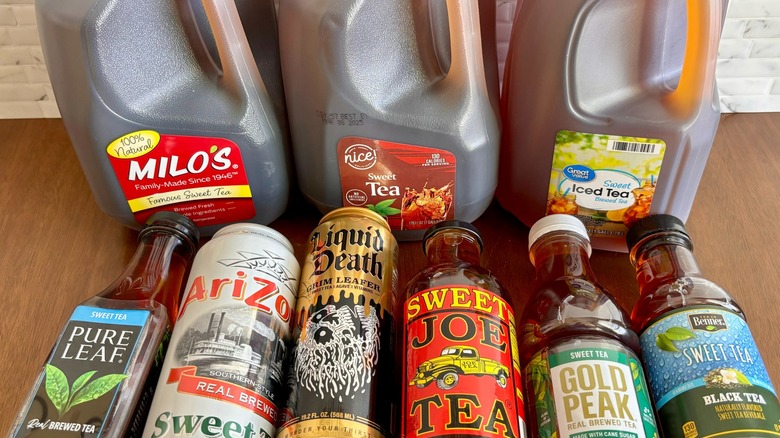 Various store-bought sweet teas on a table