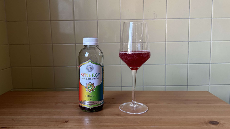 Trilogy kombucha in glass