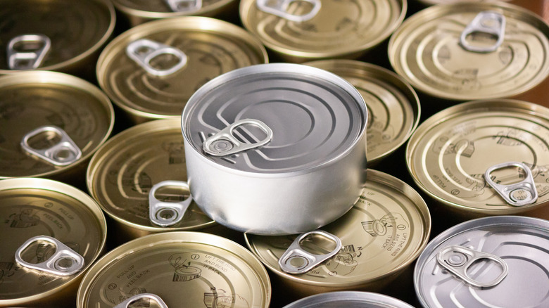 many tuna cans close together 