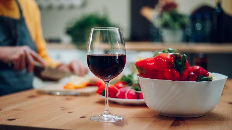 full wine glass on a counter