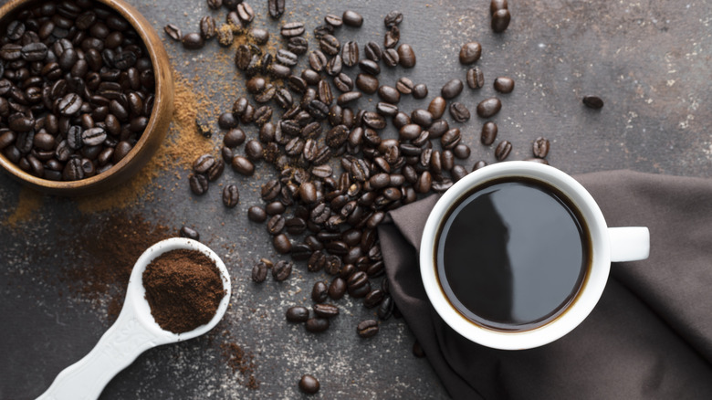 dark coffee with beans grounds