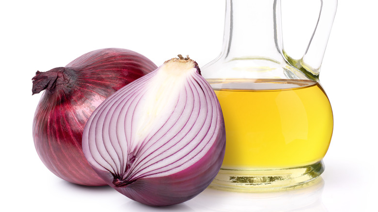 red onions and cooking oil jar