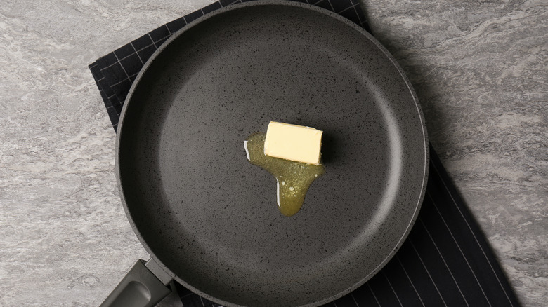 butter melting in pan