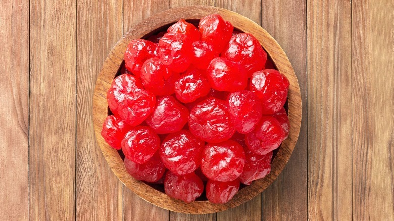 Candied cherries in wood bowl