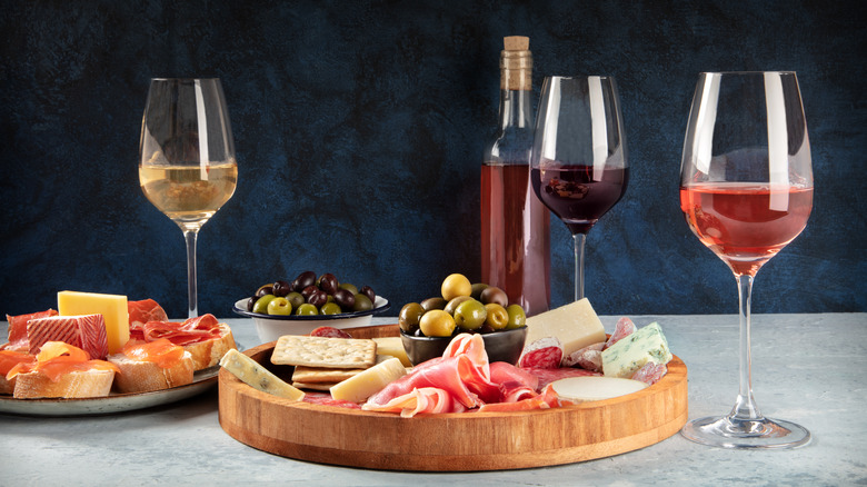 Charcuterie board and wine