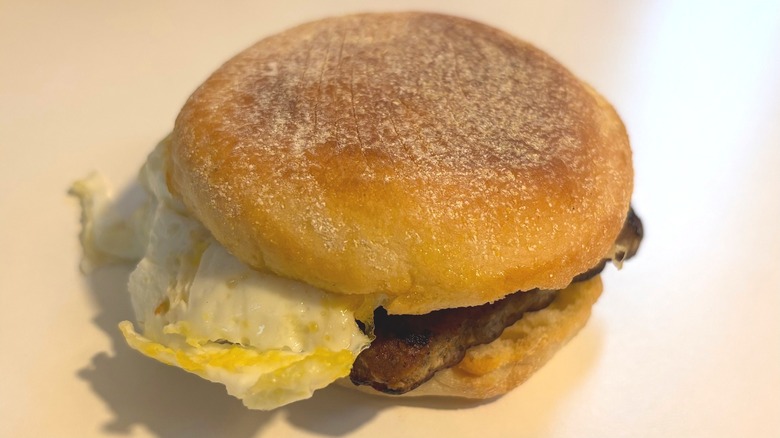 Wendy's Sausage Egg Cheese English Muffin on white table