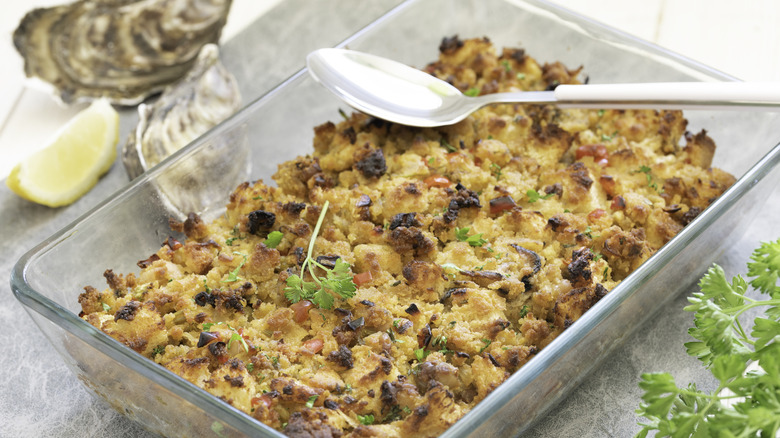 Baked oyster dressing in a glass dish