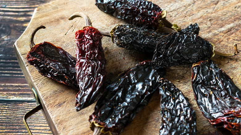 dried chipotle peppers on table