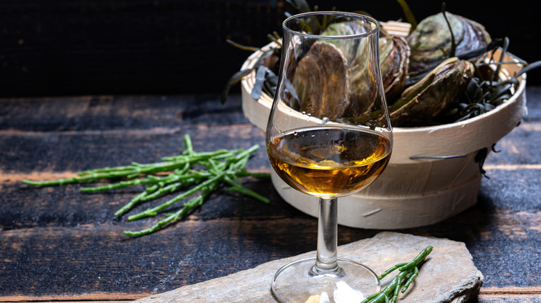 Oysters and glass of bourbon