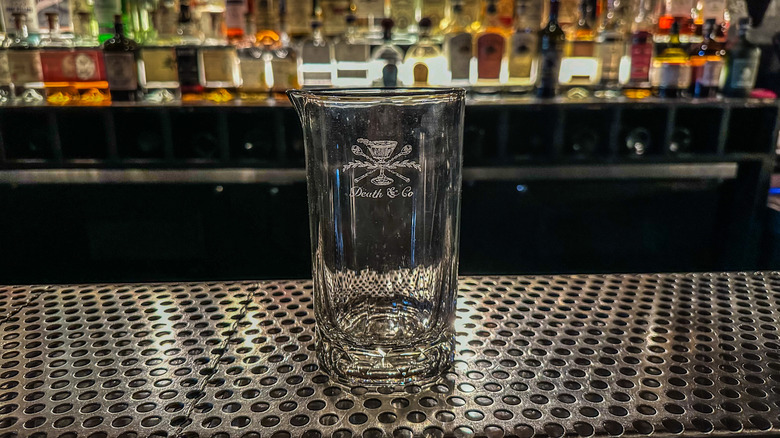 mixing glass on a bar at Death & Co