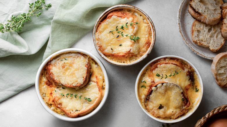 three bowls of onion soup