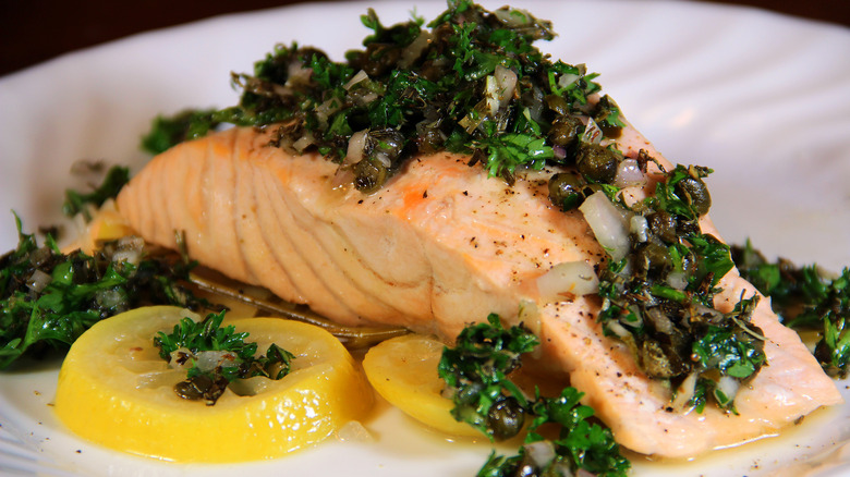 Poached salmon with lemon and herbs