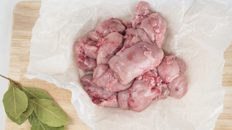 Raw sweetbreads on parchment