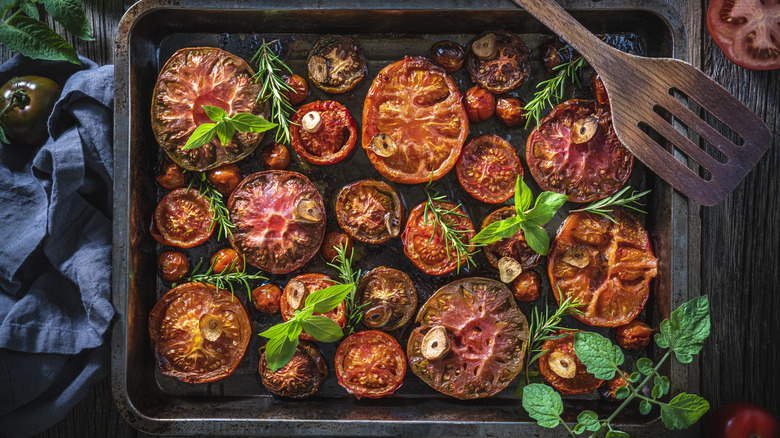 Roasted tomatoes on baking pan