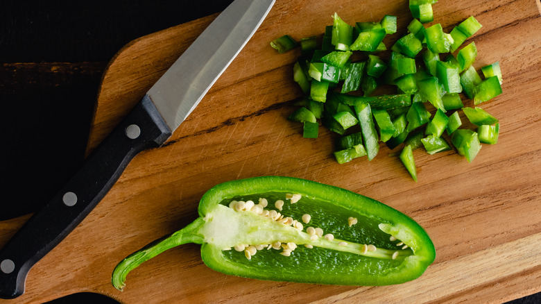 chopping jalapeños