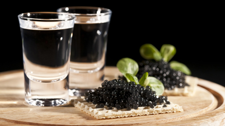 caviar and vodka in shot glasses