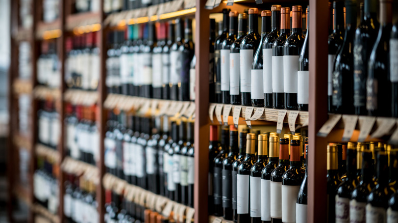 wine bottles on shelves