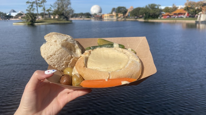 Cheese fondue in bread bowl