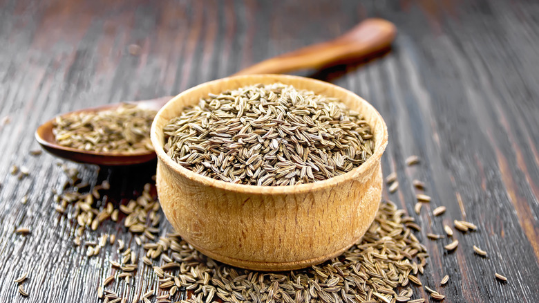 whole cumin seeds in bowl