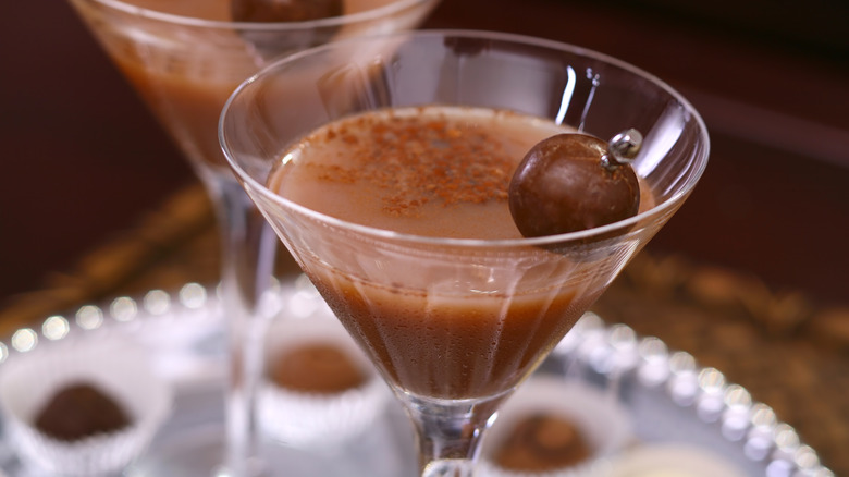 Liquid bourbon ball cocktail garnished with a bourbon ball