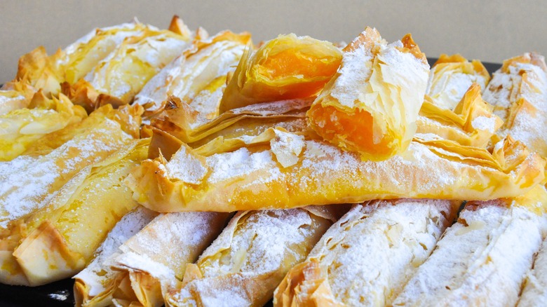 Puff pastries dusted with powdered sugar 