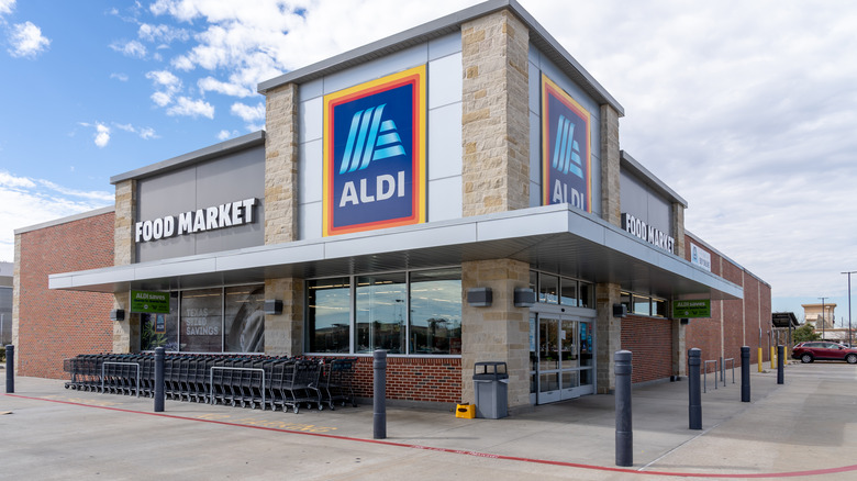 Outside an Aldi on a sunny day