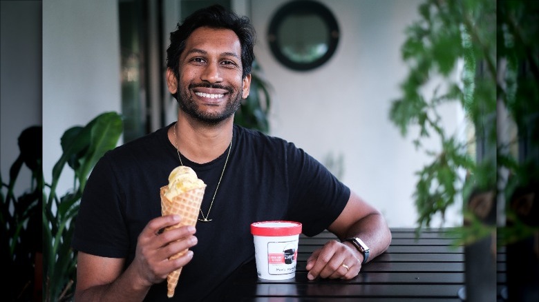 Hrishikesh Hirway holding ice cream cone