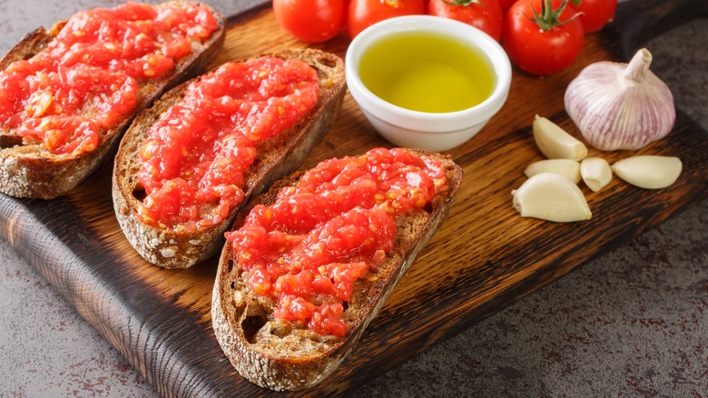 Trio of tomato toast slices