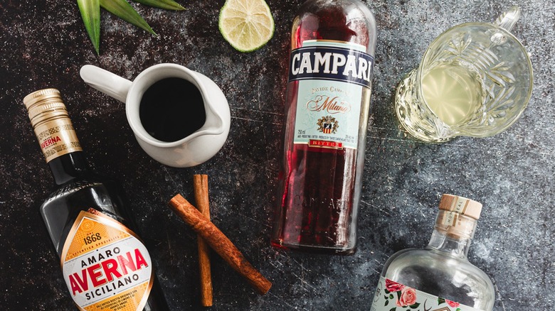 Top-down view of ingredients for a Roman Holiday cocktail on a counter