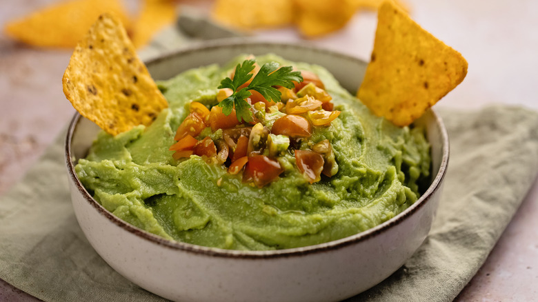 Bowl of guacamole with chips