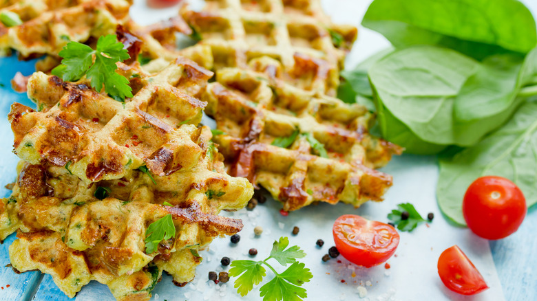 Potato waffles with cherry tomatoes