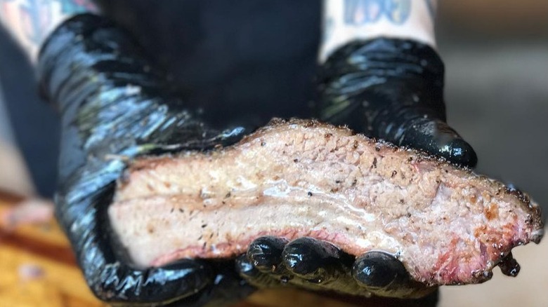 brisket in hands