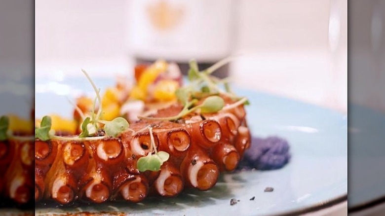 Octopus with microgreens