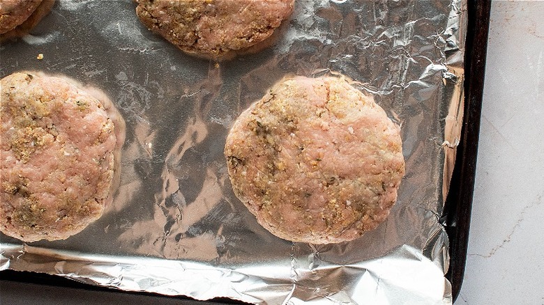 turkey patty on baking sheet