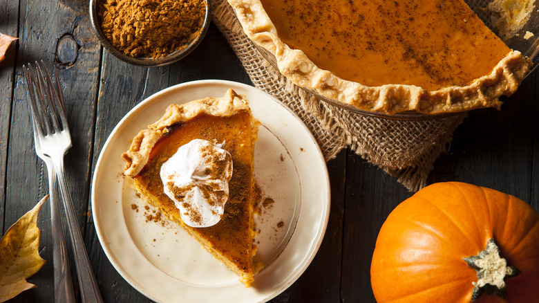 Pumpkin pie slice on plate