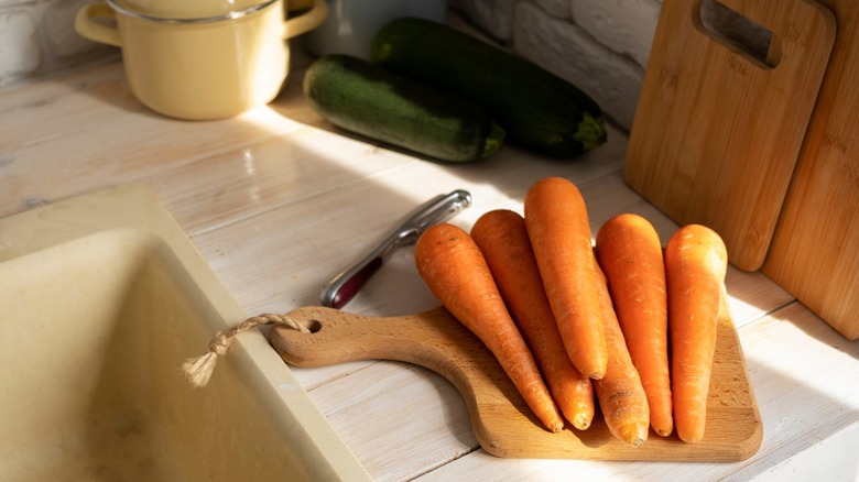 Carrots on wooden board