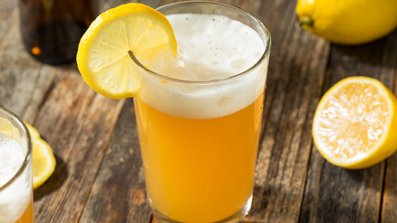 Glass of beer with lemon