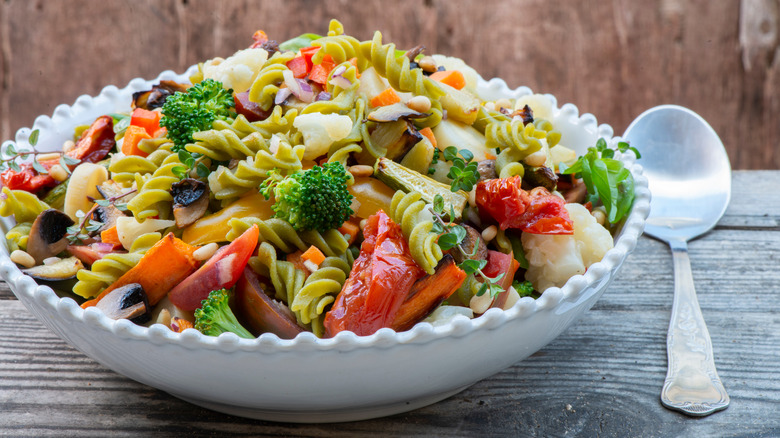 bowl of pasta salad with veggies and sweet potatoes