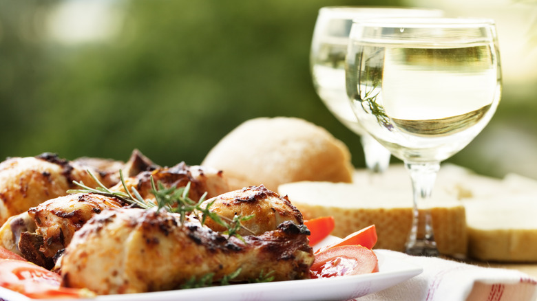 Roast chicken white wine glasses