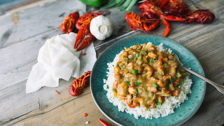  Étouffée rice bowl, fresh crawfish, whole garlic