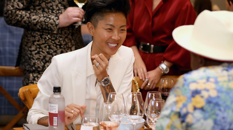 Kristen Kish smiling at a table