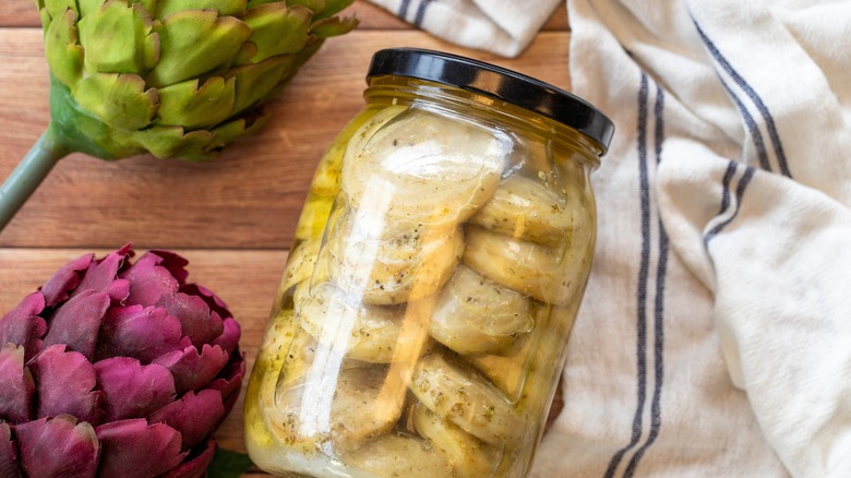 Canned artichokes in glass jar
