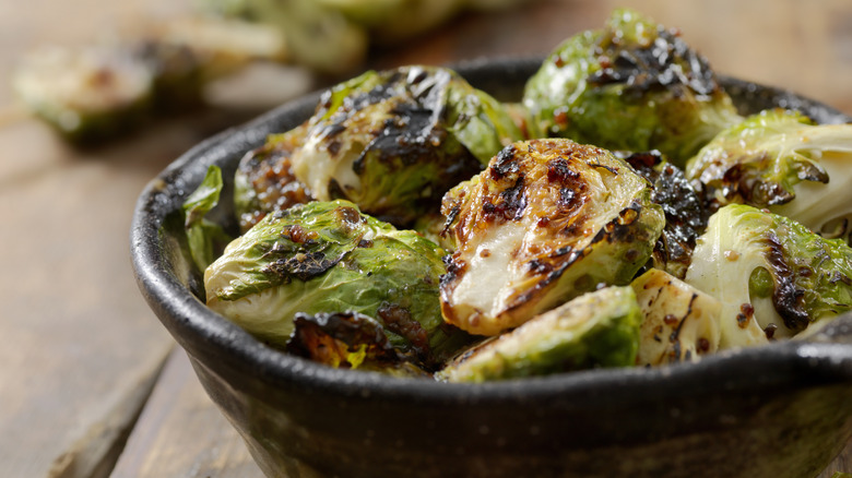 honey and balsamic glazed roasted brussels sprouts in a bowl