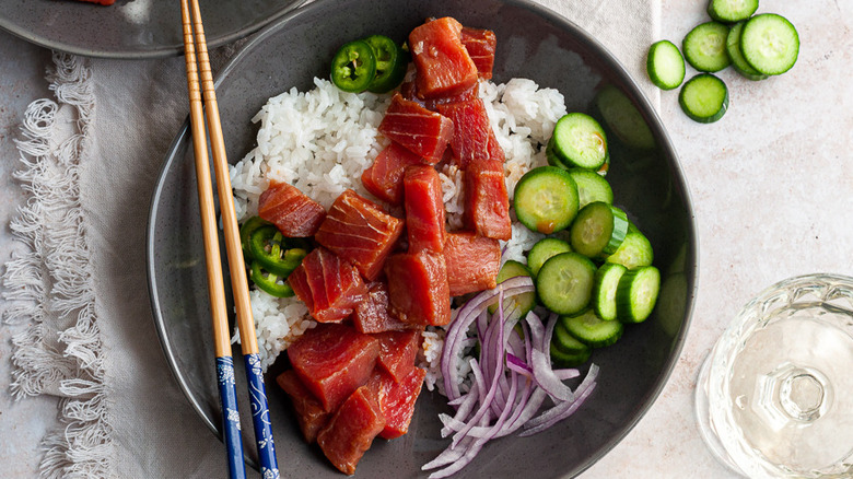 tuna poke bowl with chopsticks