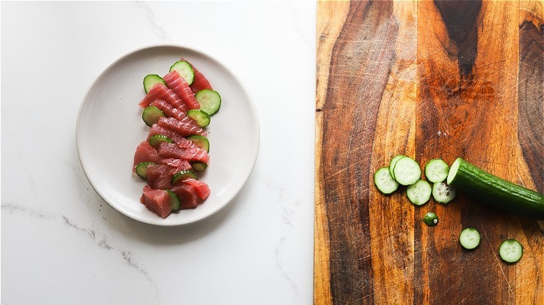 sliced cucumber with crudo