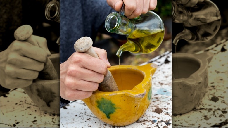 Making traditional aioli with a mortar and pestle