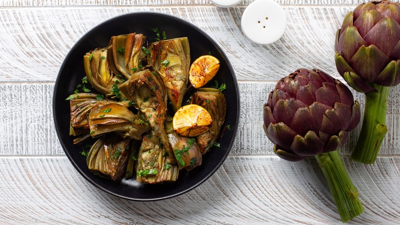 Roasted artichoke hearts and fresh ones