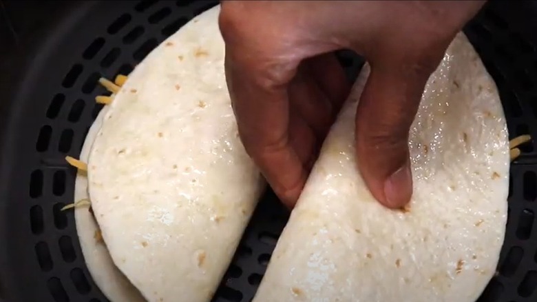 putting quesadillas in air fryer