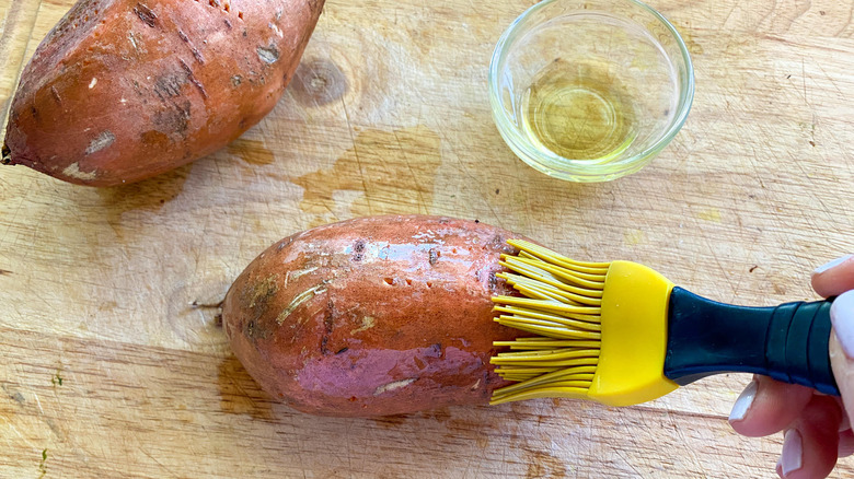 sweet potatoes brushed with oil 