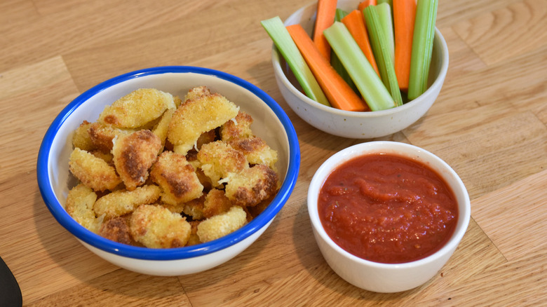 cheese curds, marinara, and veggie sticks